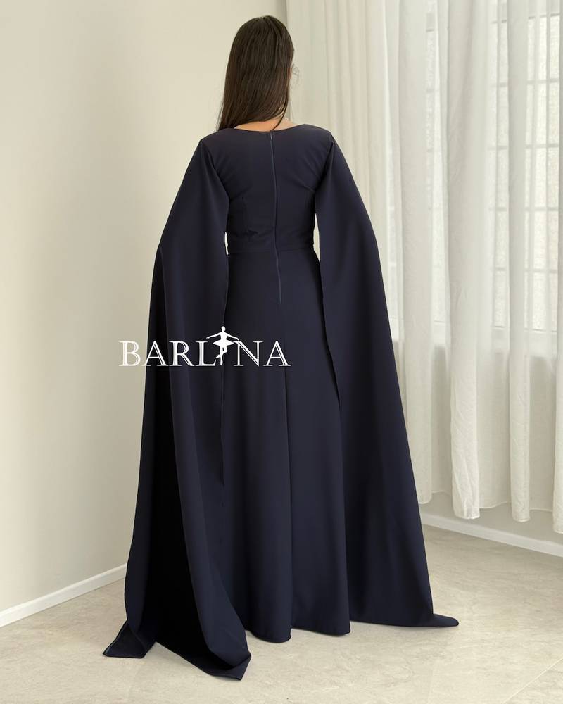 Long navy dress with flowing cape sleeves