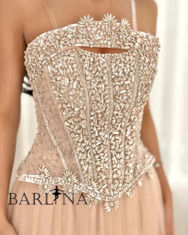Beige evening dress with embroidered corset