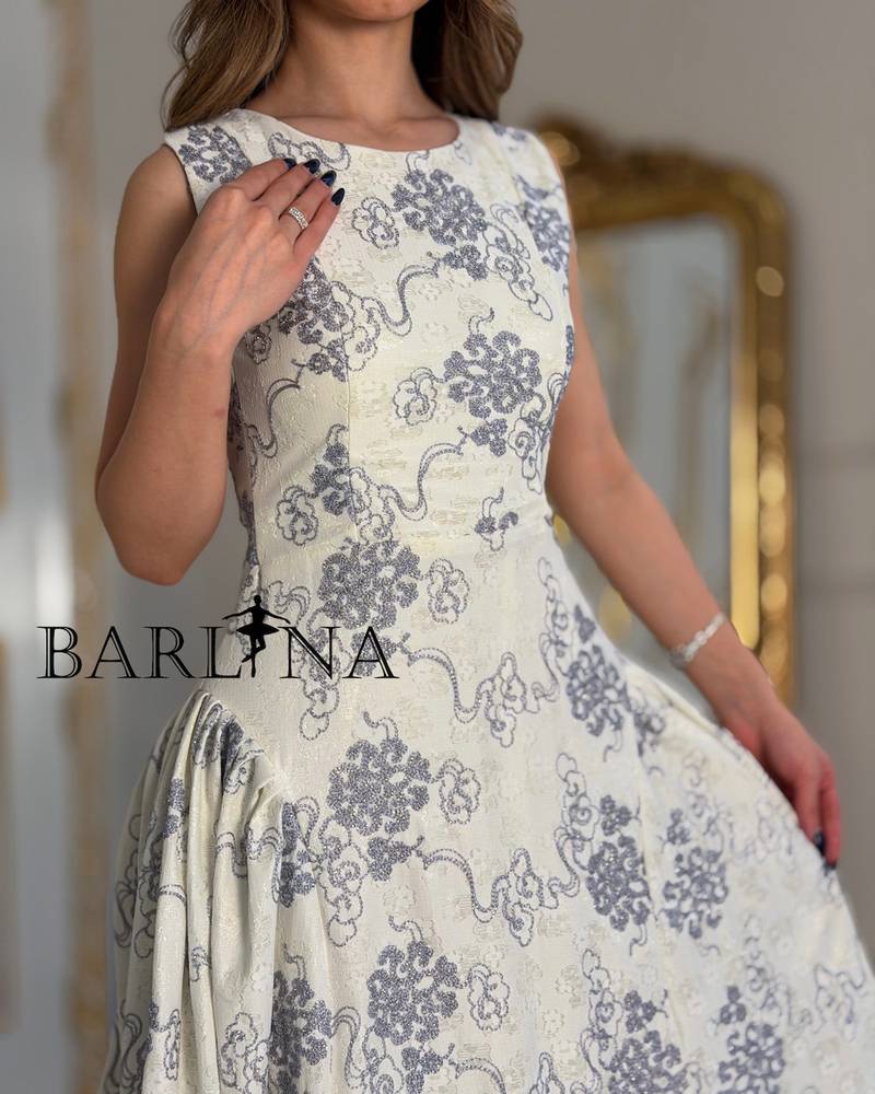 Off white lace dress with an elegant design
