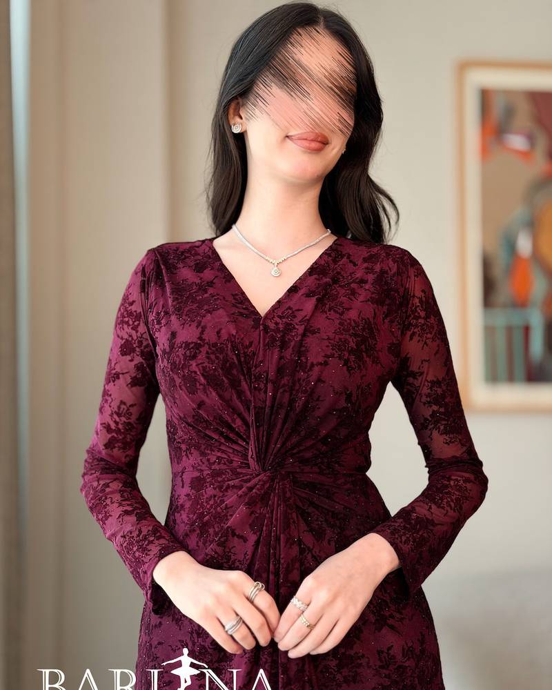 Elegant burgundy velvet dress with luxurious patterns