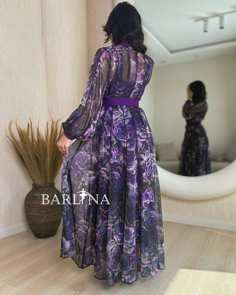 Long dress with a floral print in shades of purple