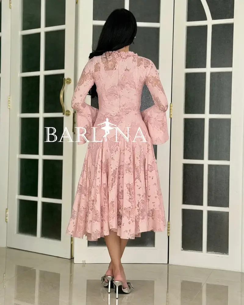 A soft dress adorned with elegant lace patterns