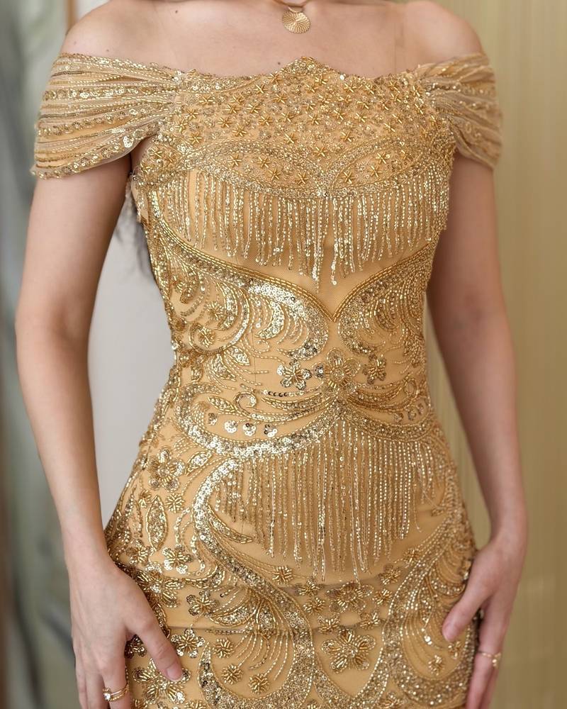 Luxurious evening dress with cascading crystal fringe