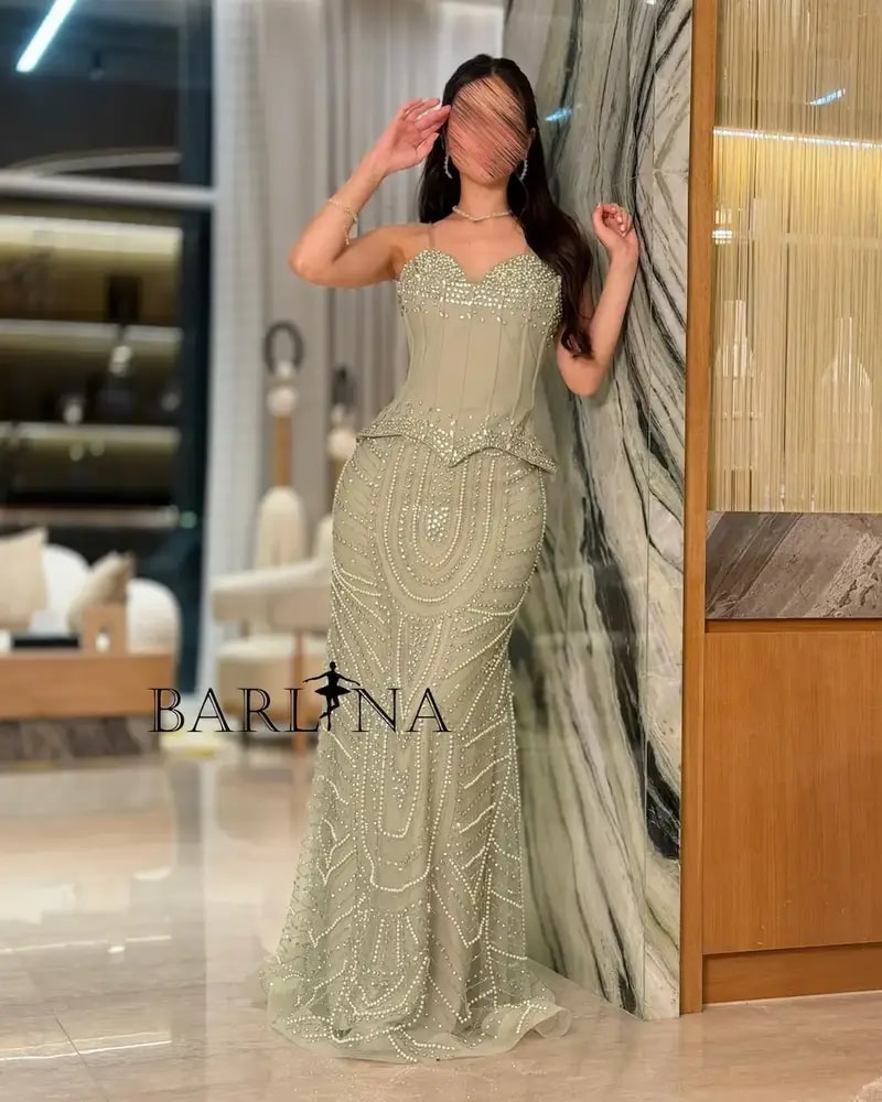 Light olive-green dress with a sleeveless corset