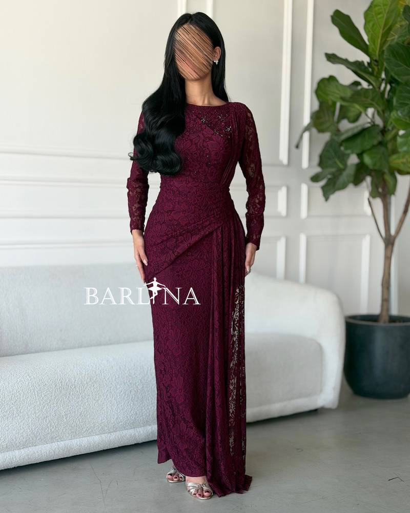 Burgundy lace dress with a fitted design
