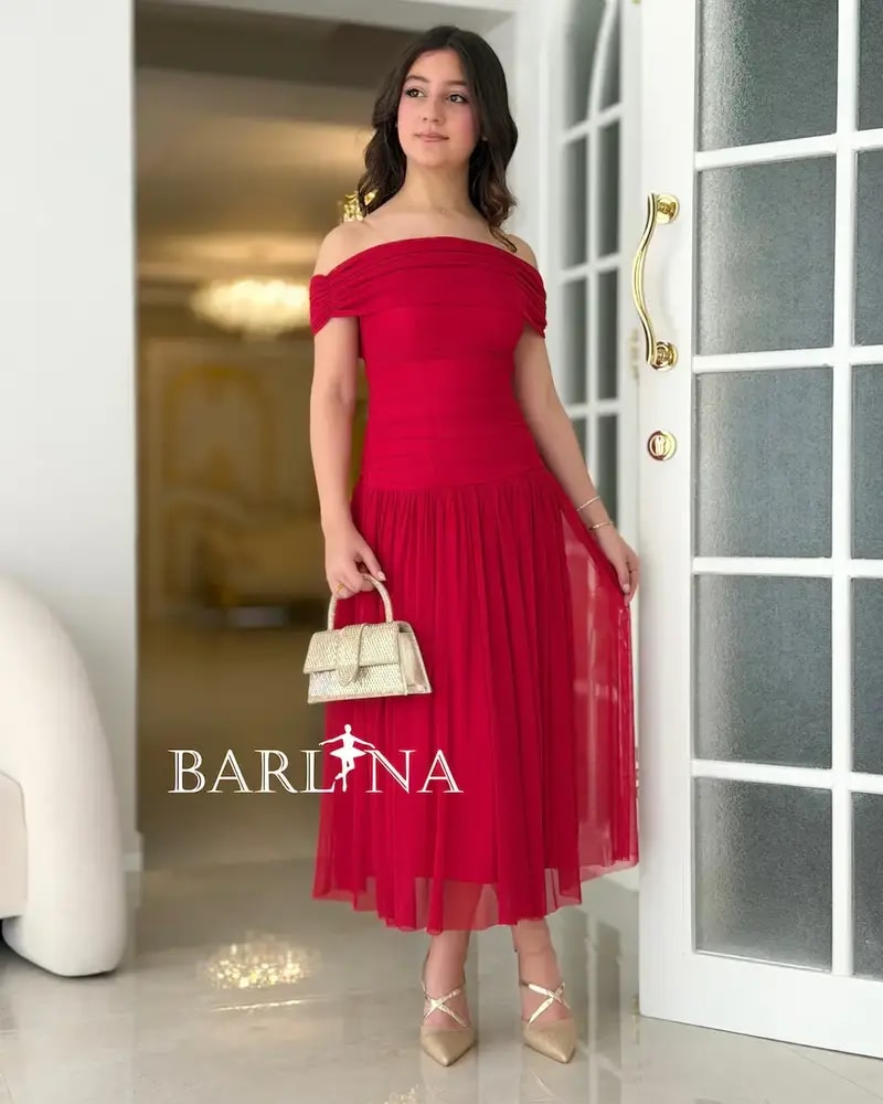 A red dress with soft chiffon layers