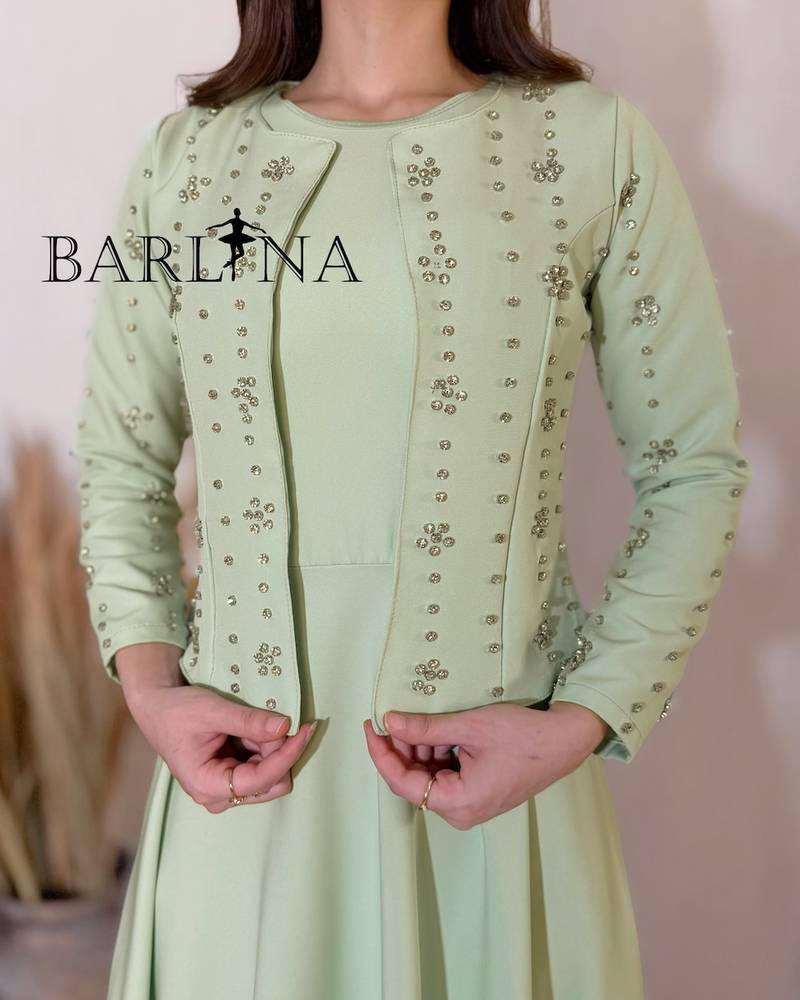 Elegant dress with a crystal-embellished jacket