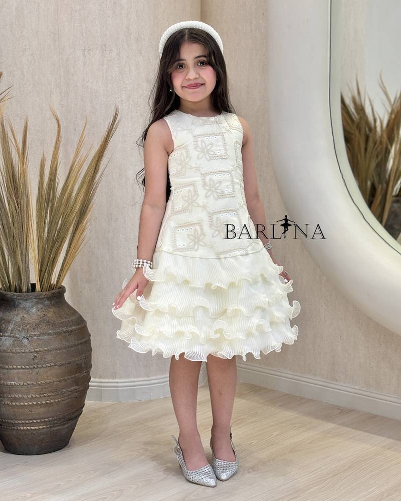 Ivory girls' dress with short ruffled layers
