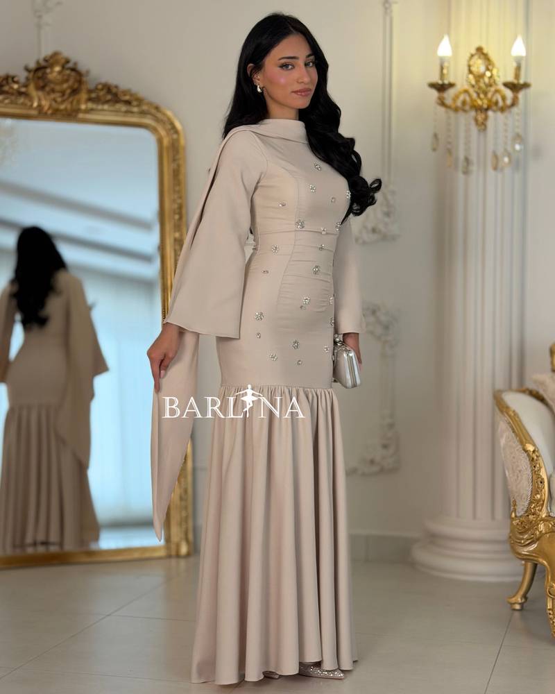 Long beige dress with shimmering details