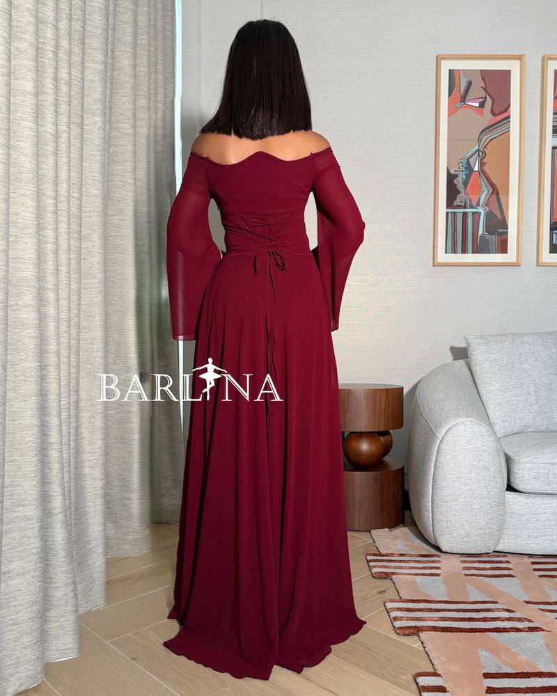 A simple burgundy dress in flowing chiffon fabric