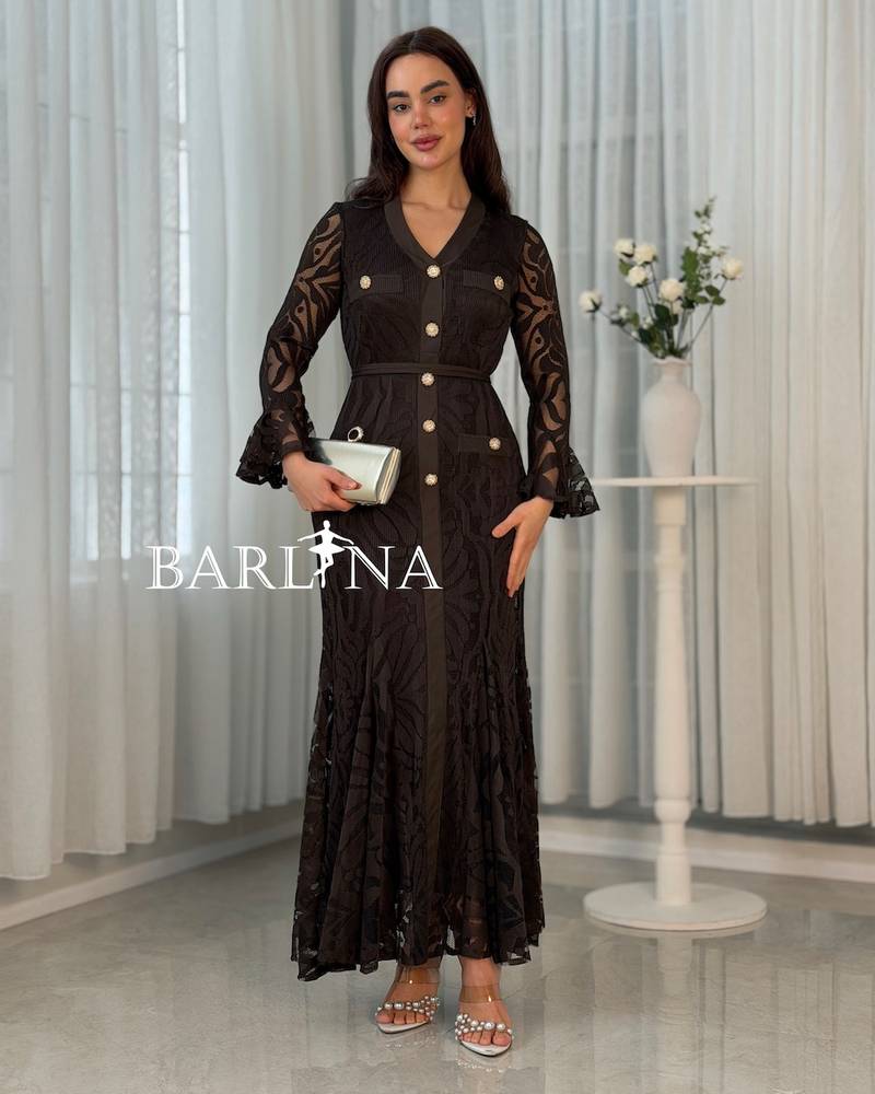 Elegant brown dress adorned with gold buttons