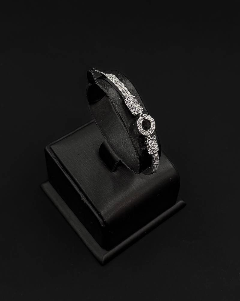 Bracelet and ring with a circular design