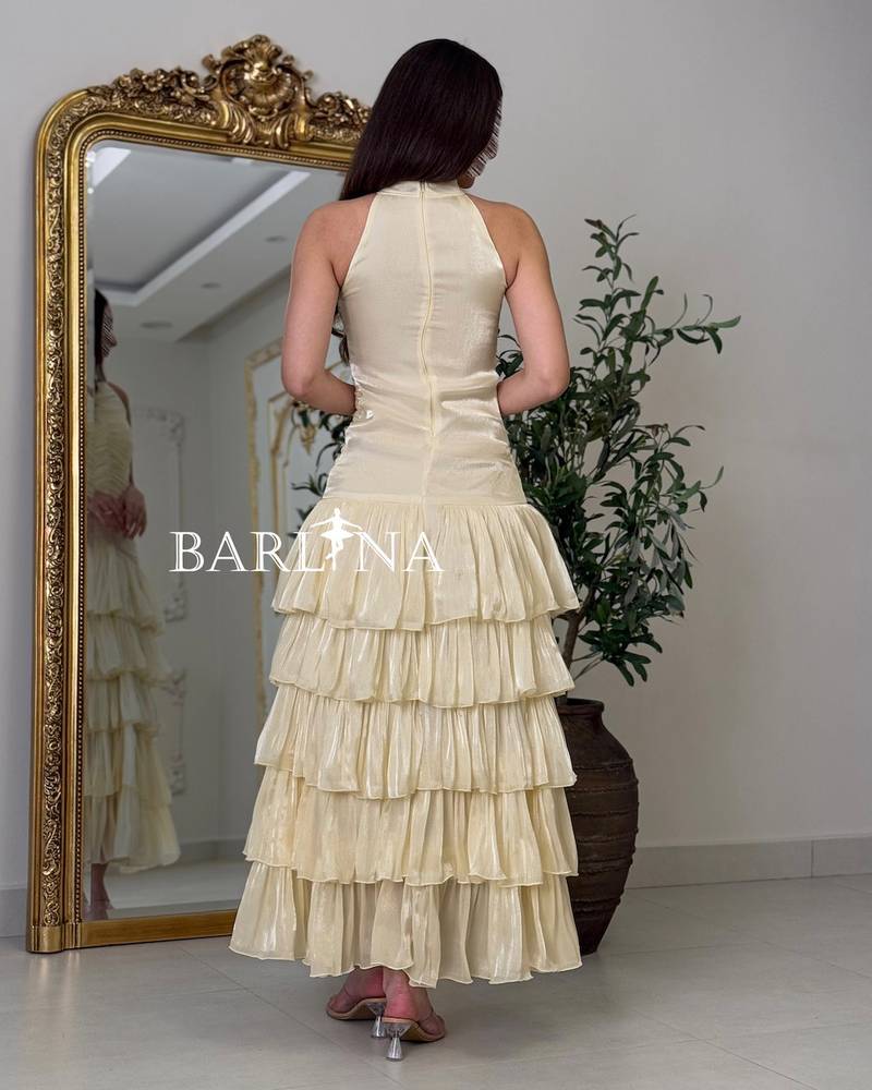Beige dress with tiered flared skirts