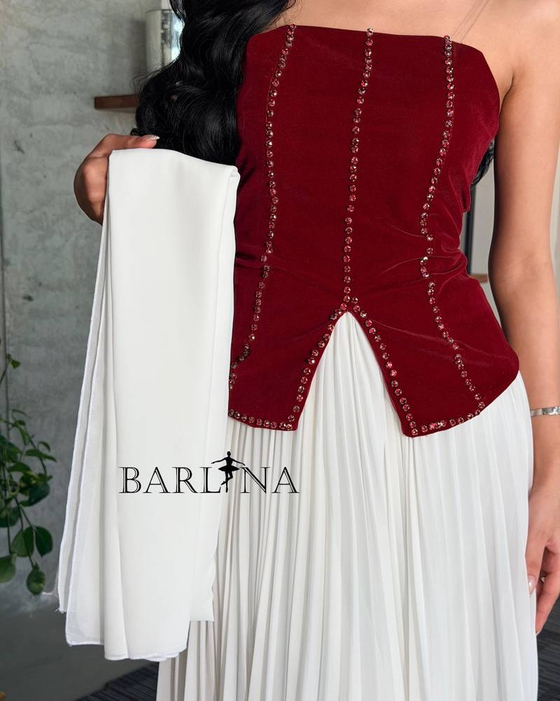 White pleated dress with a velvet bodice