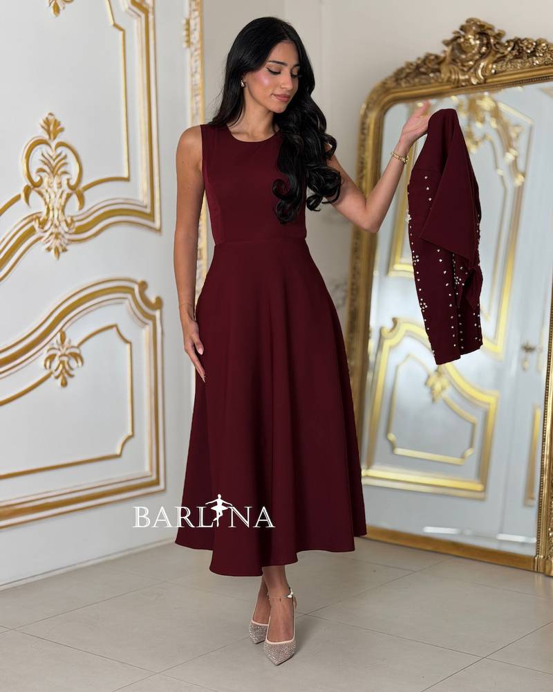 Elegant dress with a crystal-embellished jacket