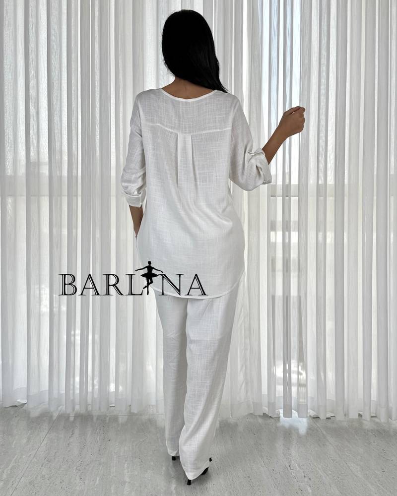 Soft white set embroidered with brown threads