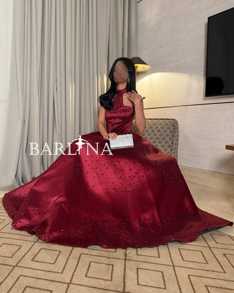 Burgundy evening dress with sequins and halter neck