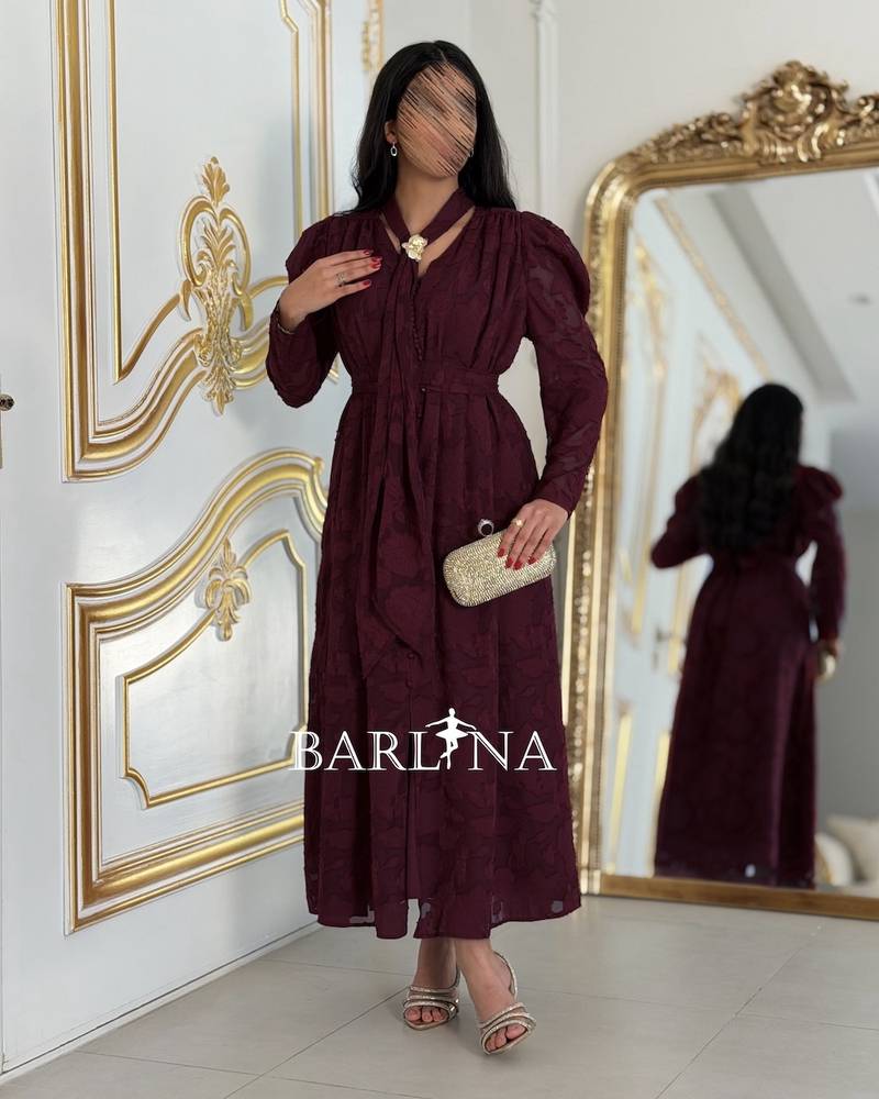 A soft burgundy dress with patterned fabric