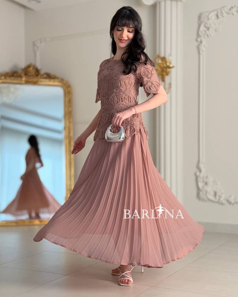 Soft pleated dress with embroidered bodice