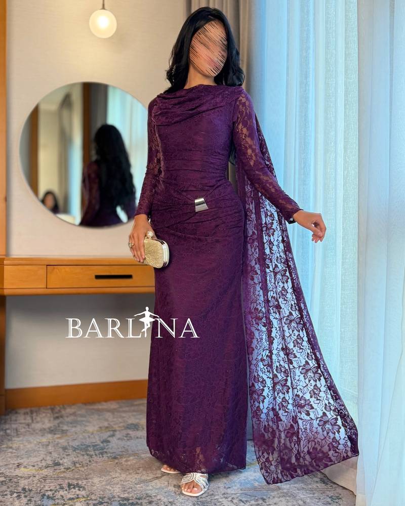 Elegant purple lace dress with a draped shawl