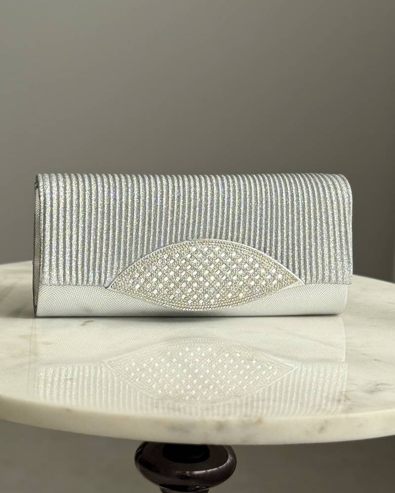 A bag decorated with a front panel made of rhinestones
