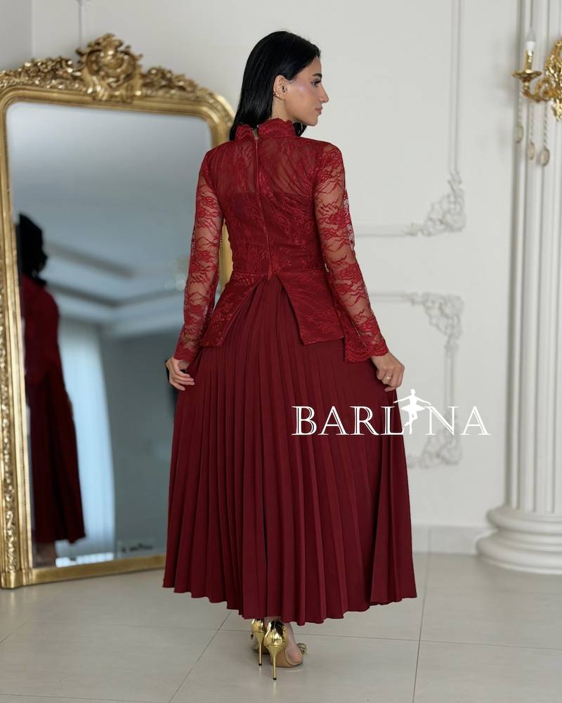 Red lace and pleated dress with long sleeves