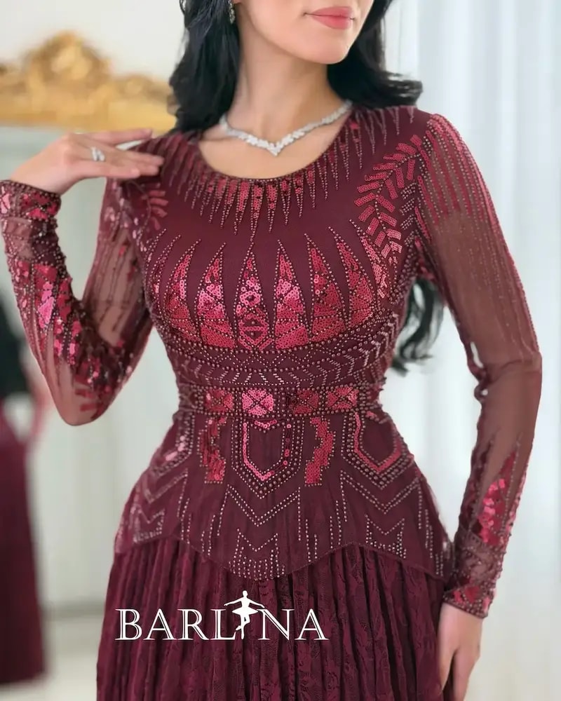 Lace evening dress with embroidered bodice