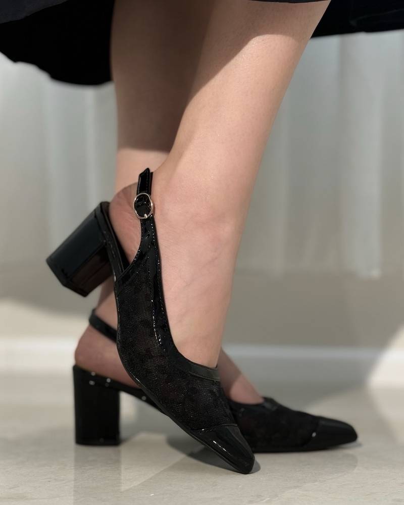 Elegant women's heels with delicate lace embroidery