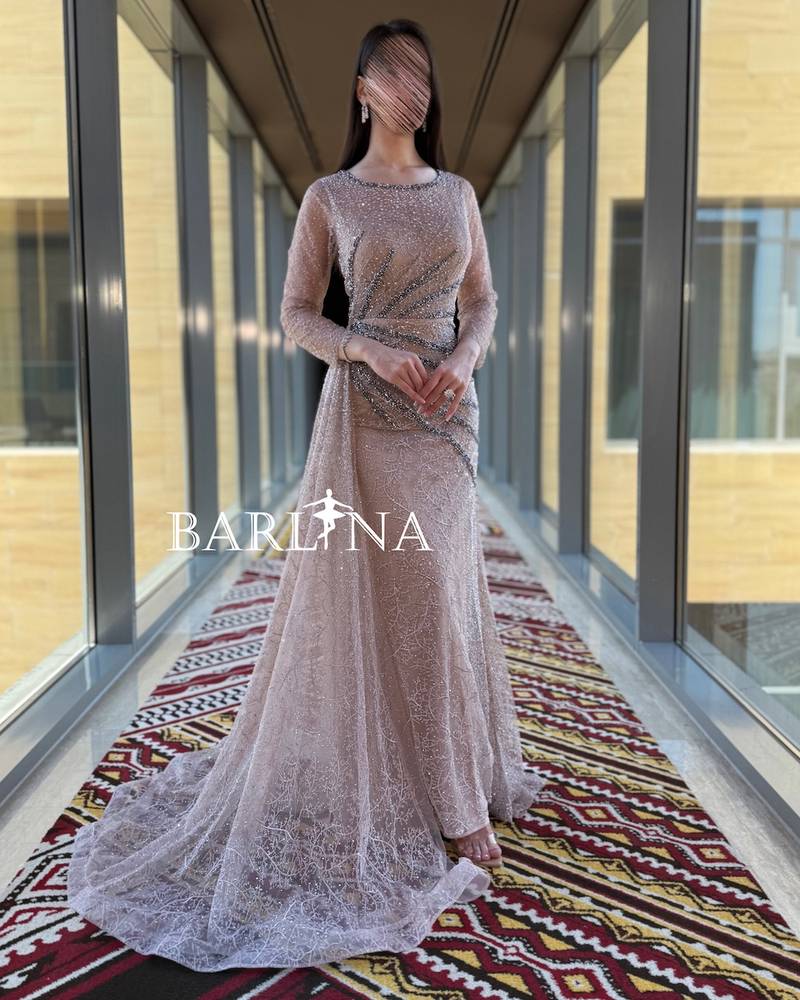 Embroidered nude dress with side train and silver studs