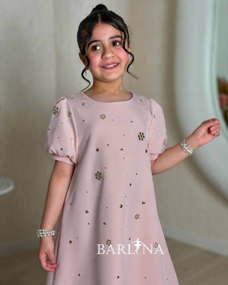 Pink girls' dress with a simple and elegant design
