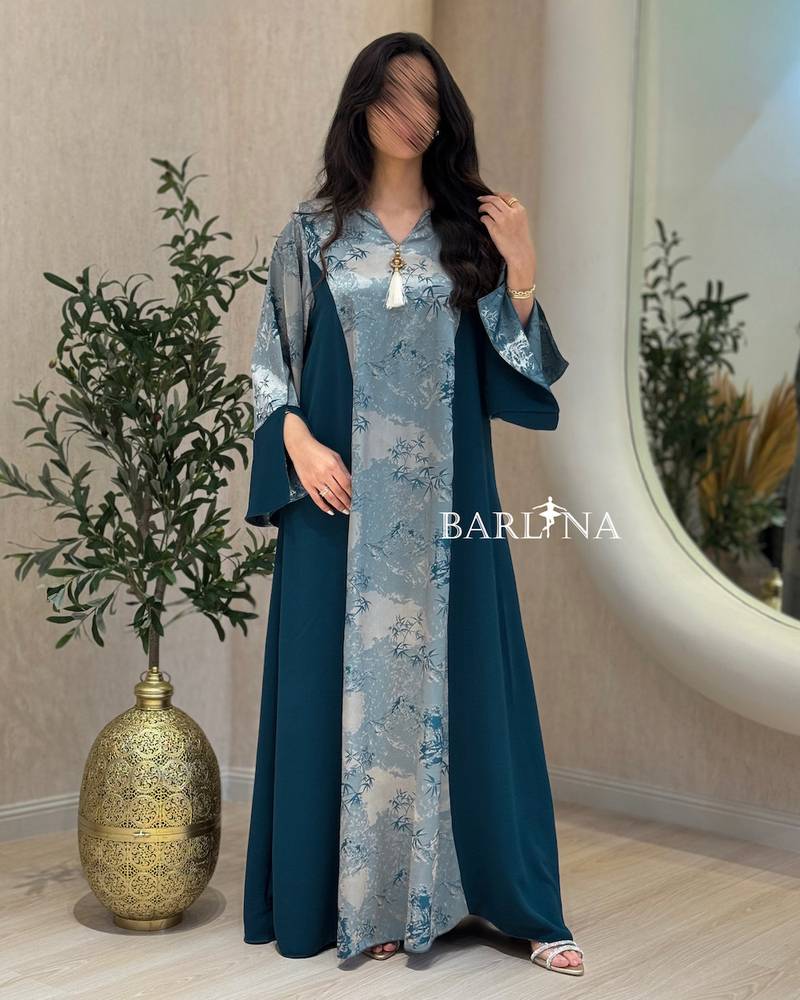 Blue jalabiya with a floral front detail