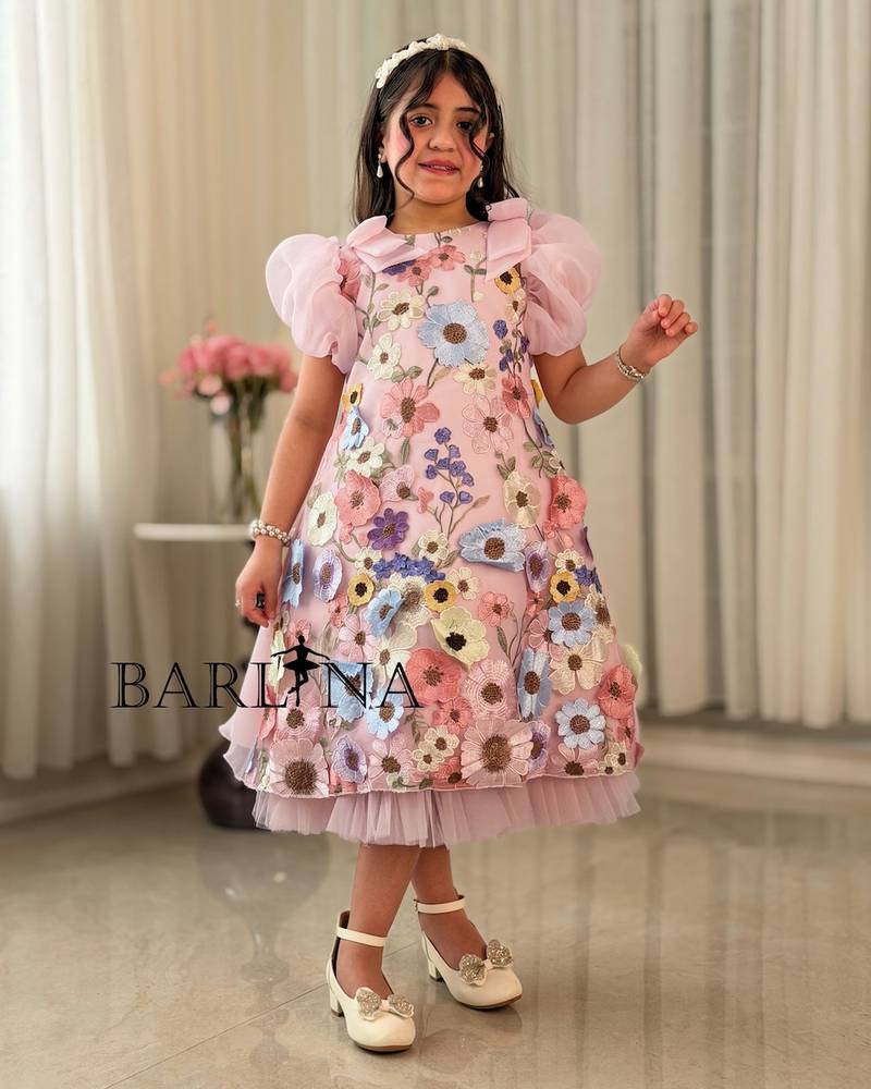 Pink girls' dress embroidered with raised roses