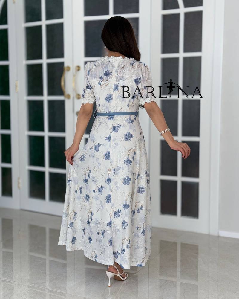 A soft dress with an elegant sky-blue rose pattern