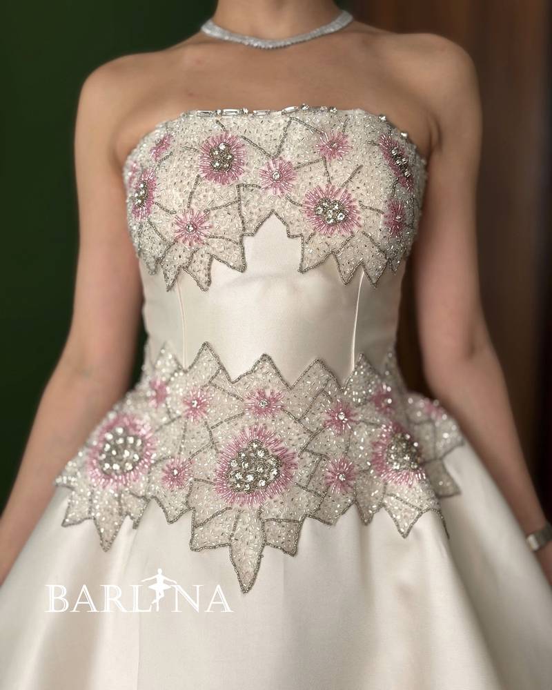 Off-white dress with a pearl-embroidered bodice