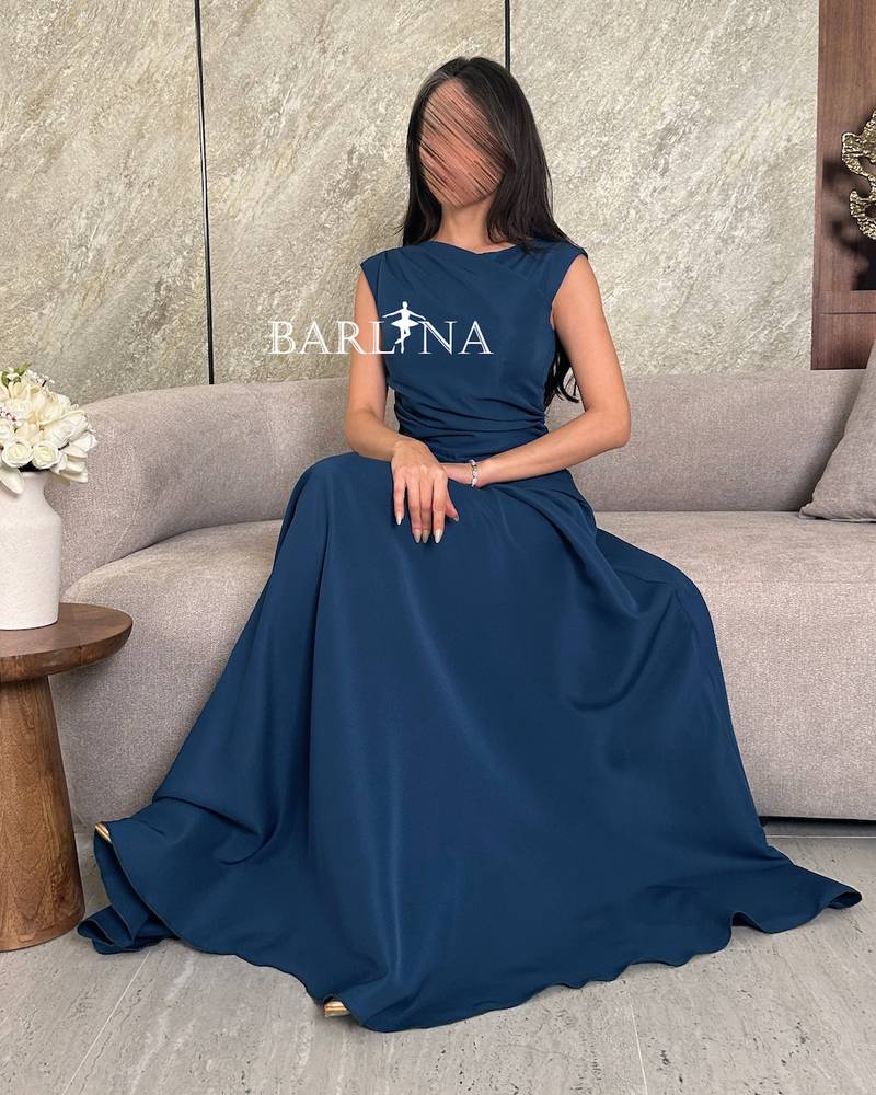 Navy blue dress with ripples at the waist