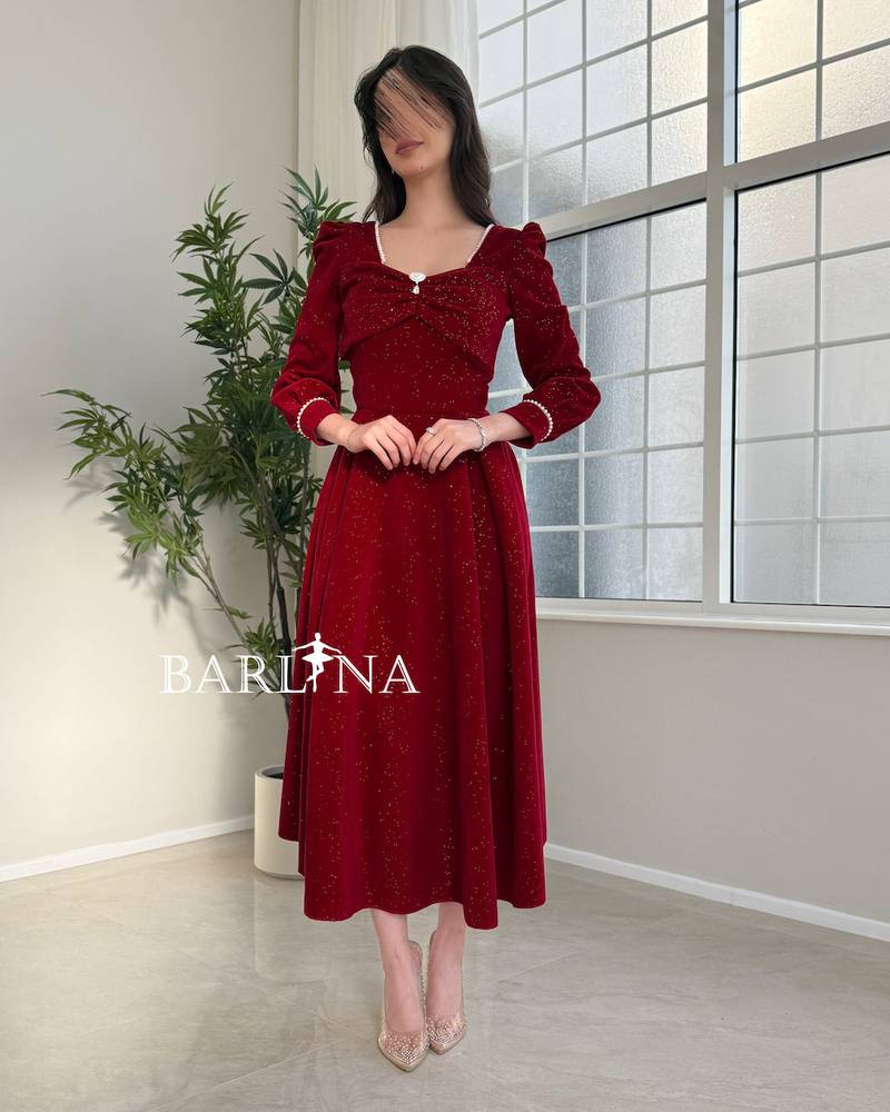 Red midi dress with shimmering details
