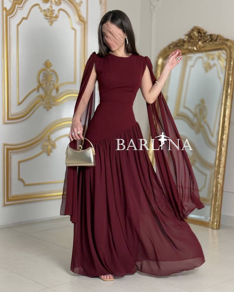 Burgundy fitted dress with cape sleeves