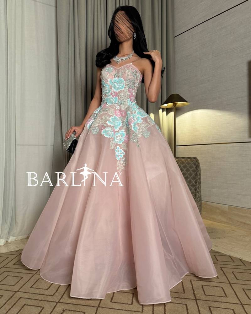 Pink dress with colorful embroidered flowers