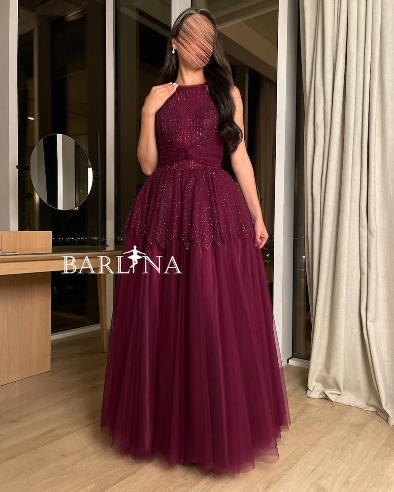 Burgundy dress with tulle and small stones