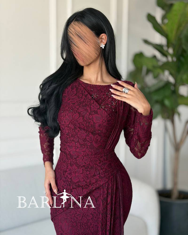 Burgundy lace dress with a fitted design