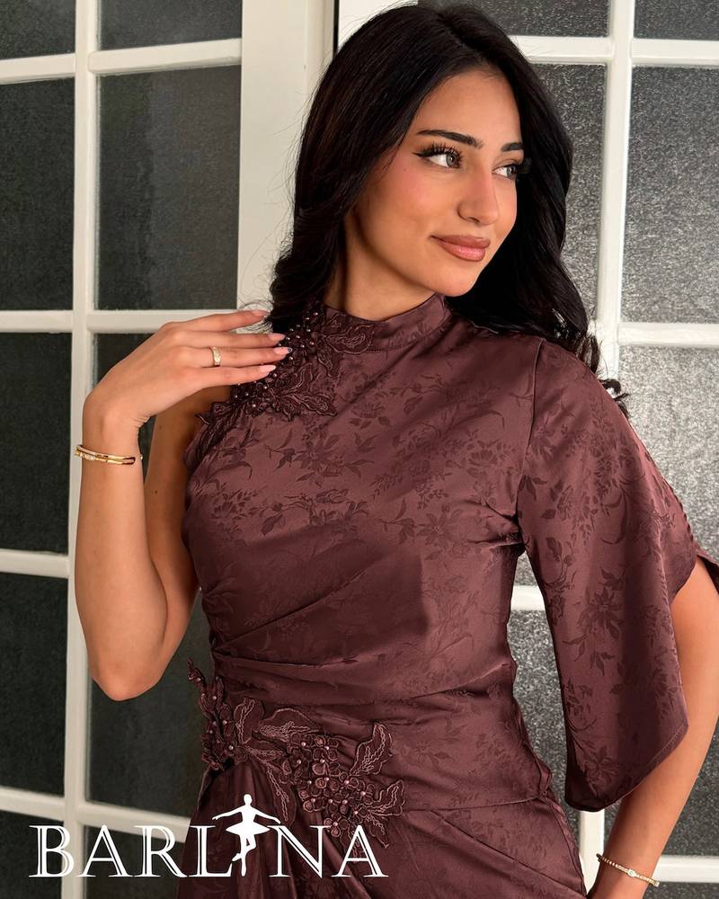 A long dress with a delicate pattern and elegant design