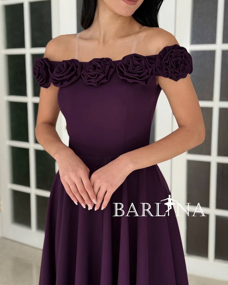 A soft purple dress decorated with roses