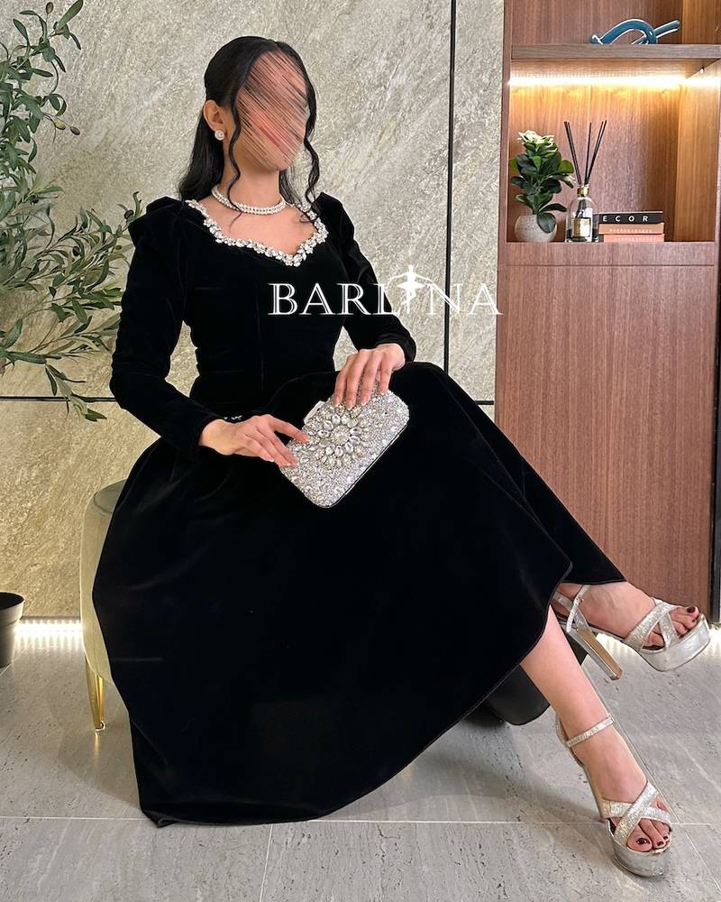 Black velvet dress with crystal embellishment