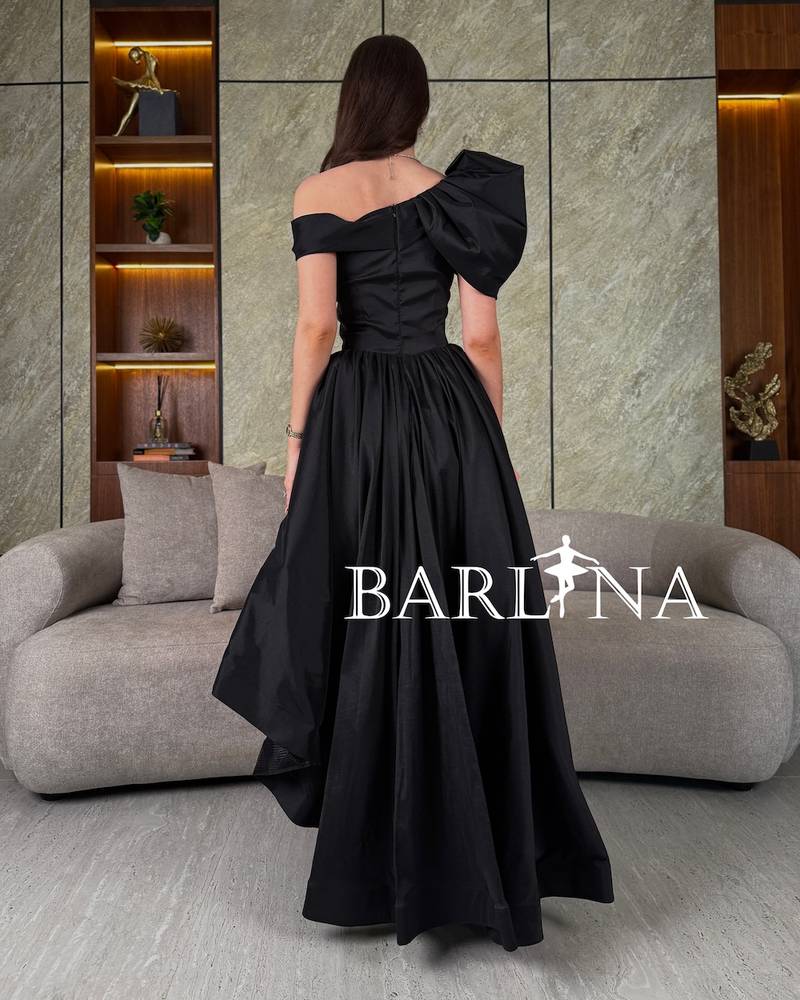 Black off-shoulder dress with slanted length
