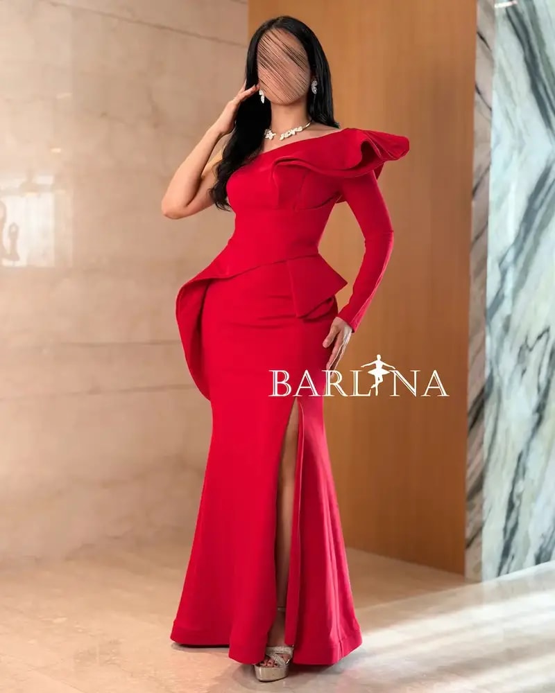 Red dress with a fitted design and front slit