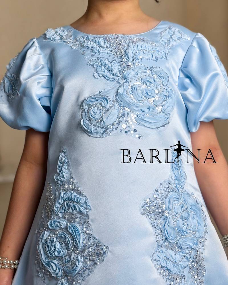 Luxurious blue girls dress with shimmering details