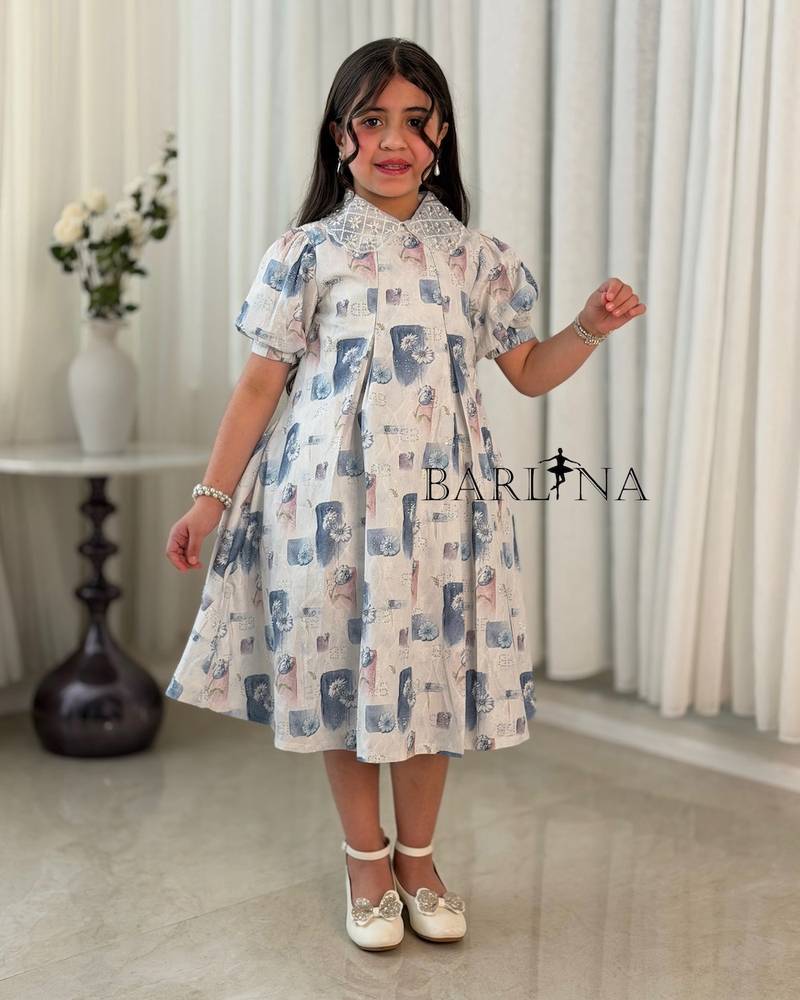 Girls' dress decorated with printed patterns