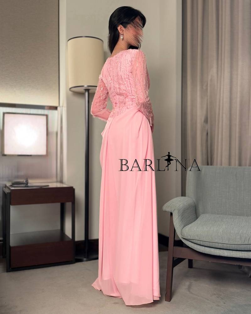Pink draped dress with sheer embroidered sleeves