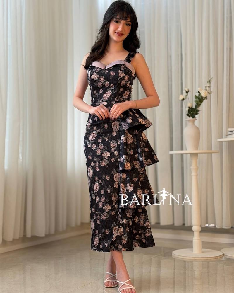 Black dress with mauve roses and side layers