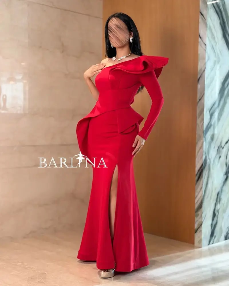 Red dress with a fitted design and front slit